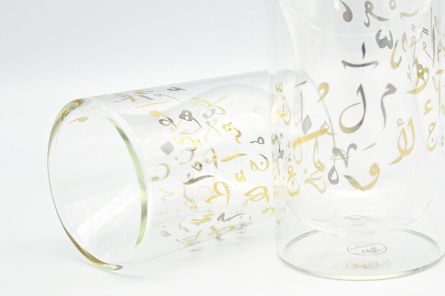 Set of Arabic calligraphy cups in gold and silver finishes