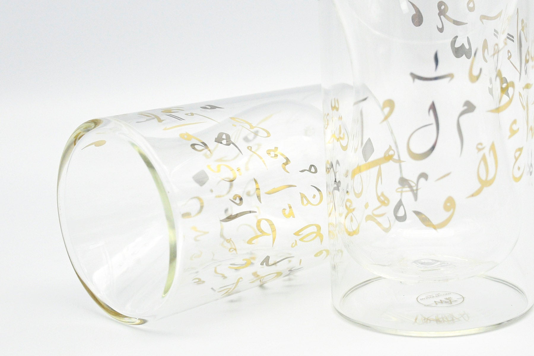 Set of Arabic calligraphy cups in gold and silver finishes