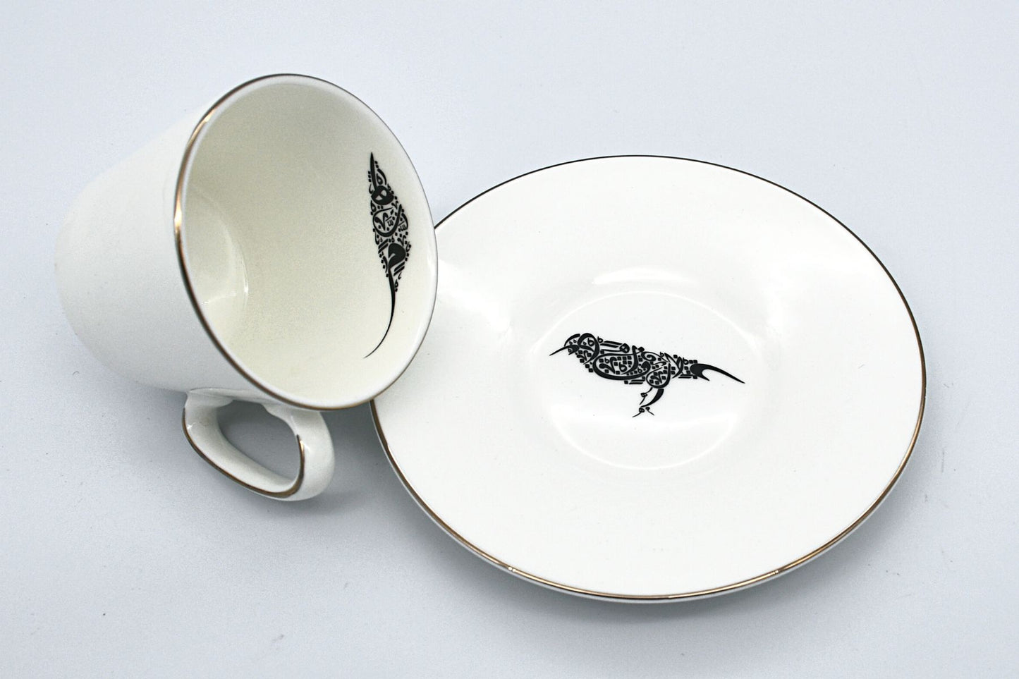 Ceramic Arabic coffee cups with fine bird illustration