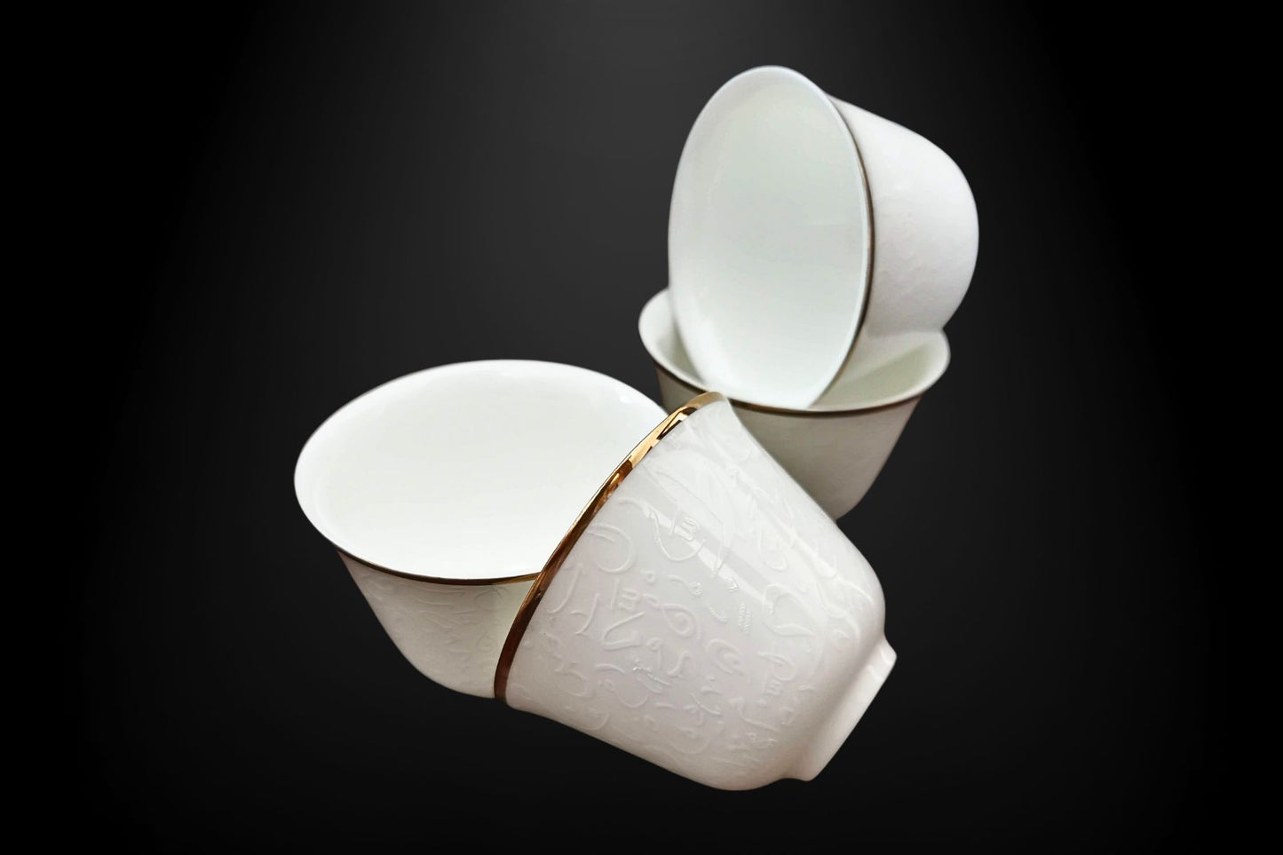 Classic Gahwa cups with traditional Arabic script
