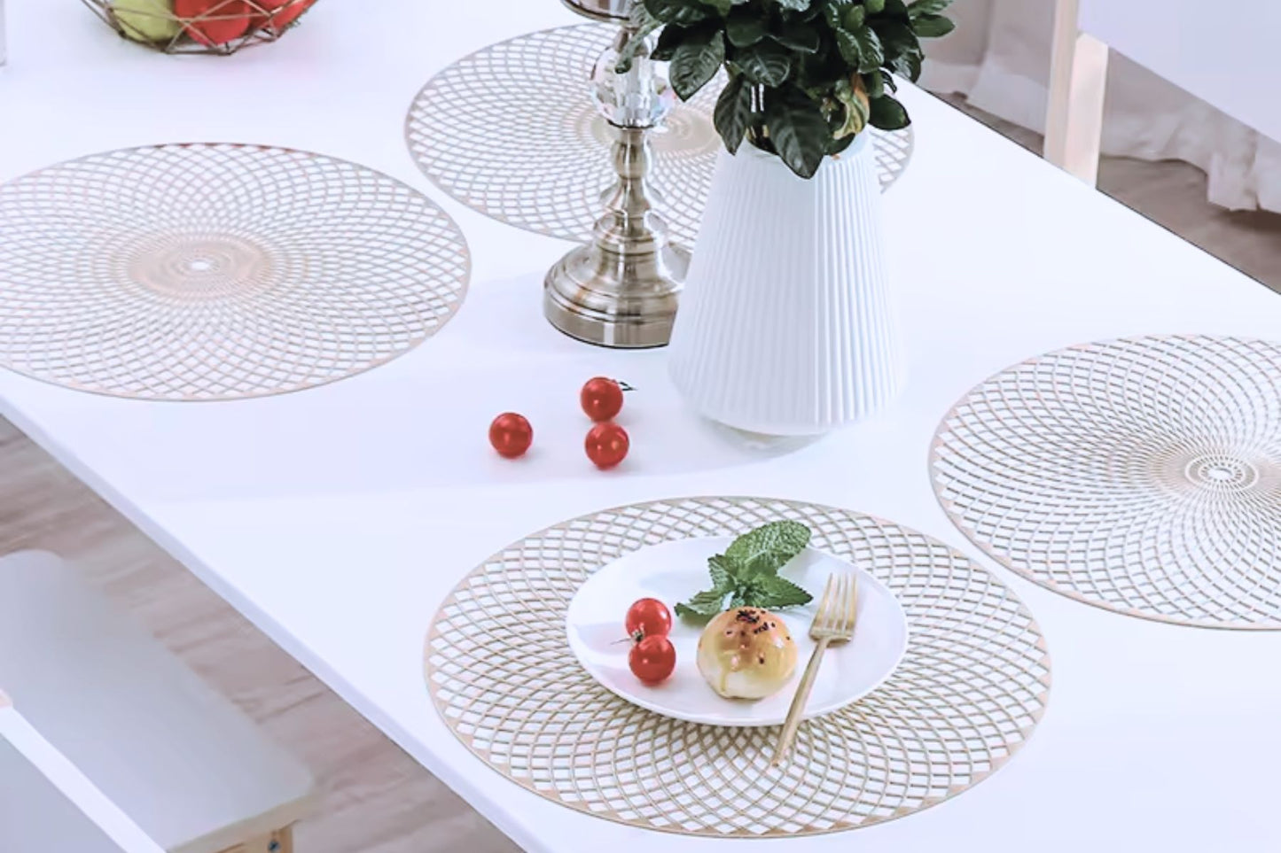 Elegant table setting featuring gold leaf placemat