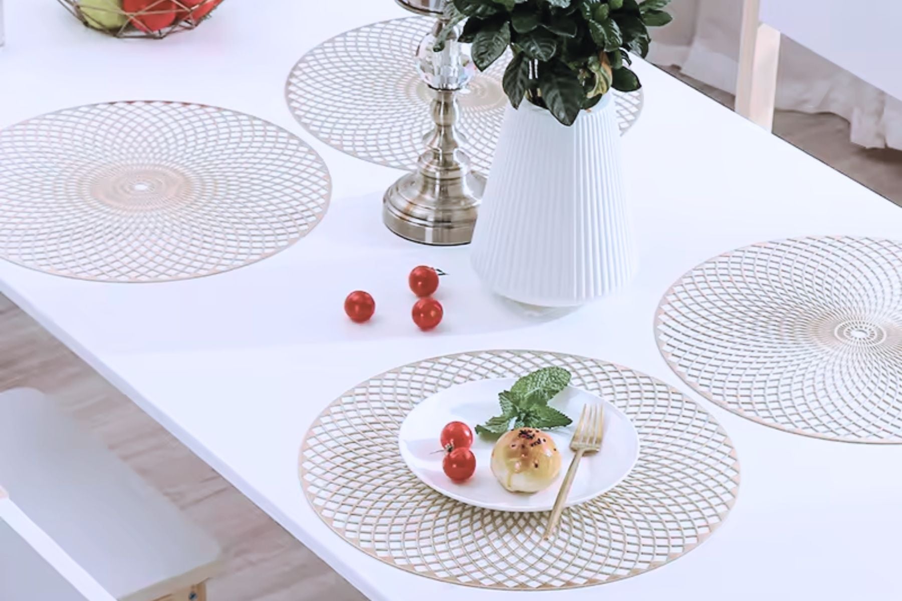 Elegant table setting featuring gold leaf placemat