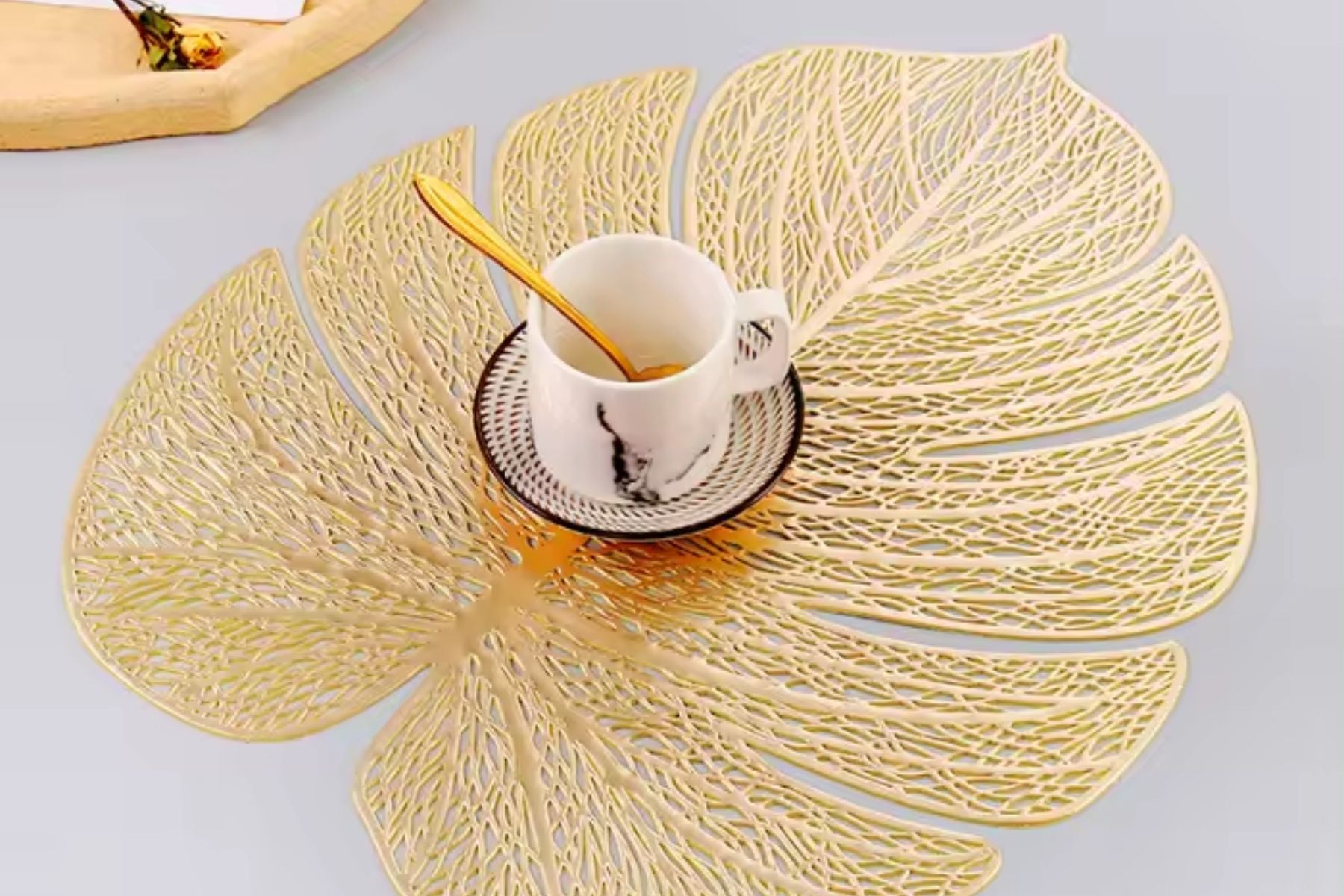 Festive table decor with elegant gold placemat
