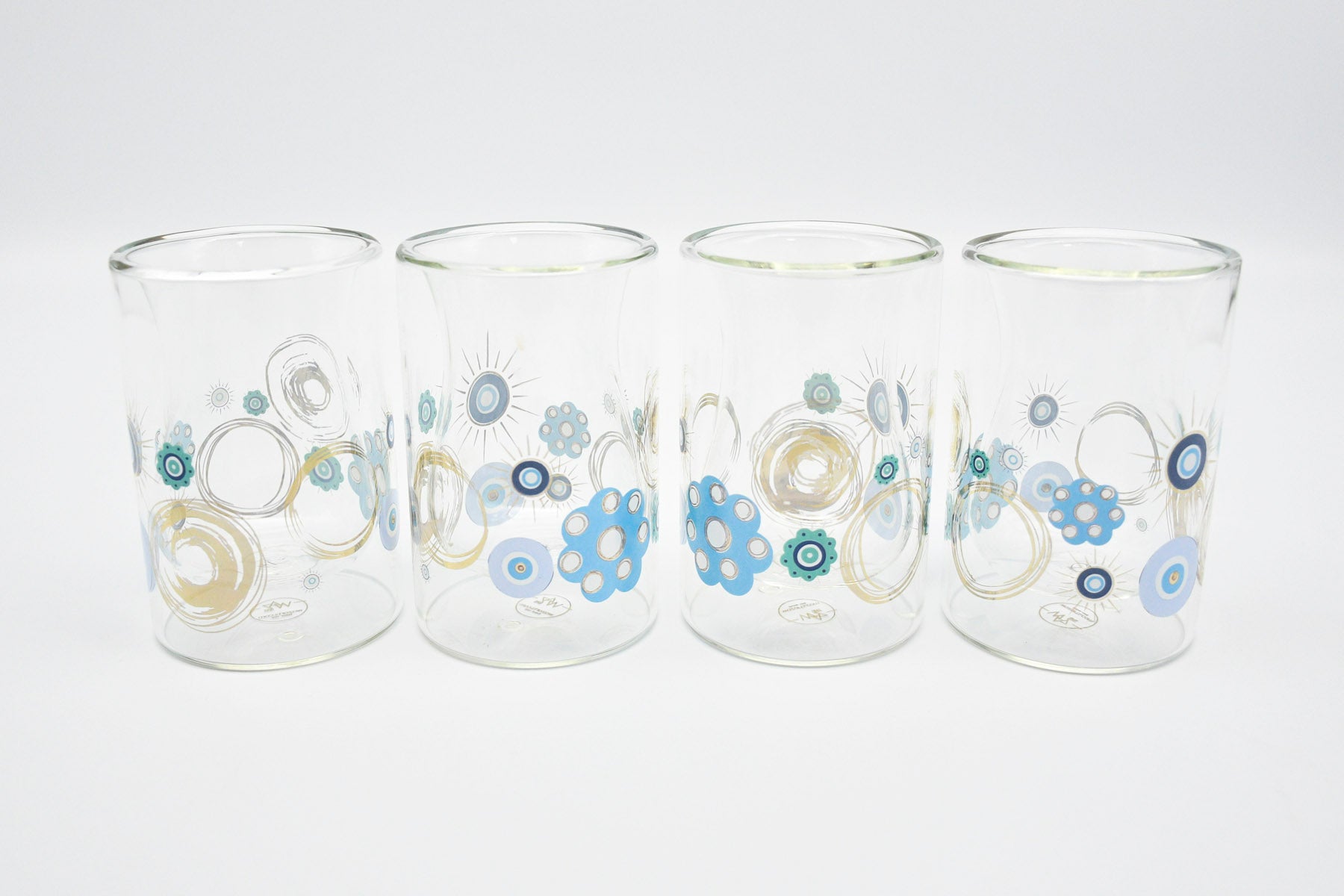 WAZ Arts turquoise cups with geometric design
