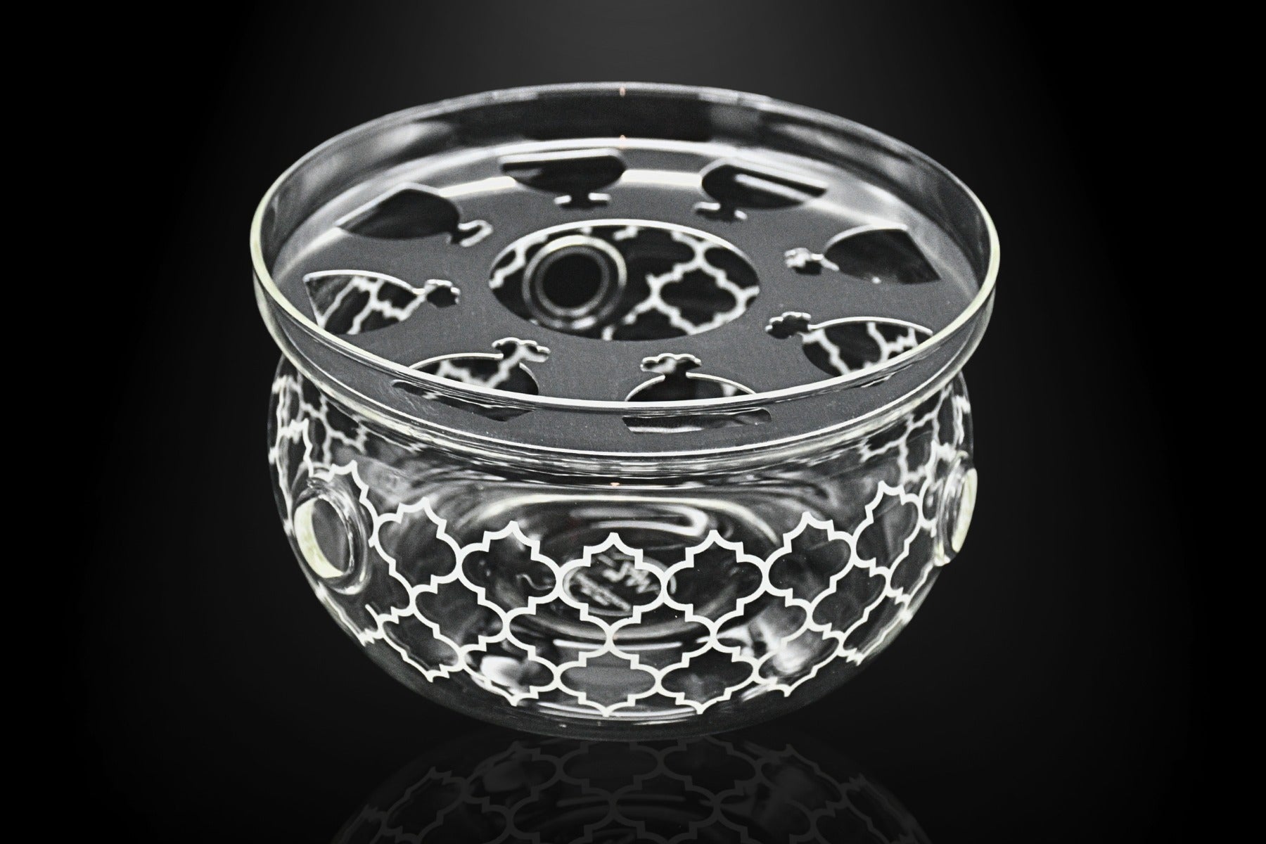 Front view of porcelain geometric pattern warmer in black and gold