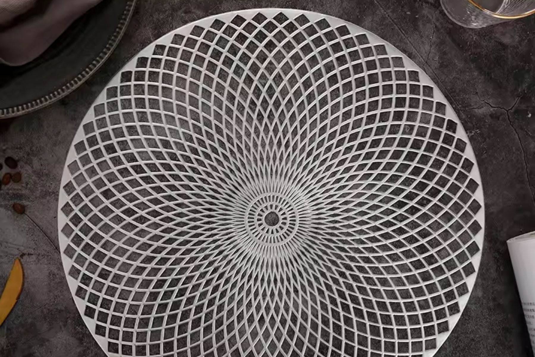 Gold leaf placemat in use during a formal dinner