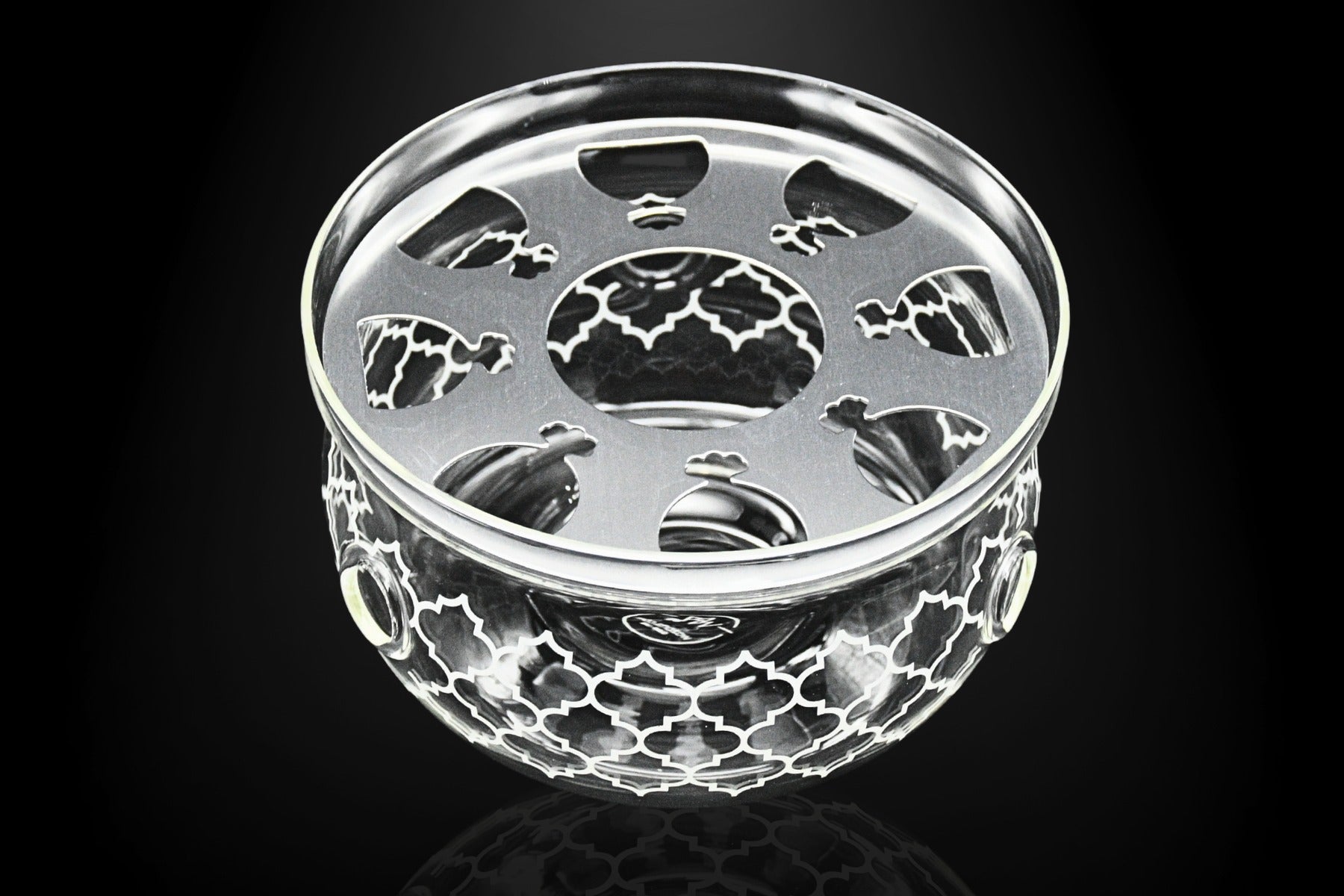 Glossy porcelain tea warmer with gold accents and geometric design