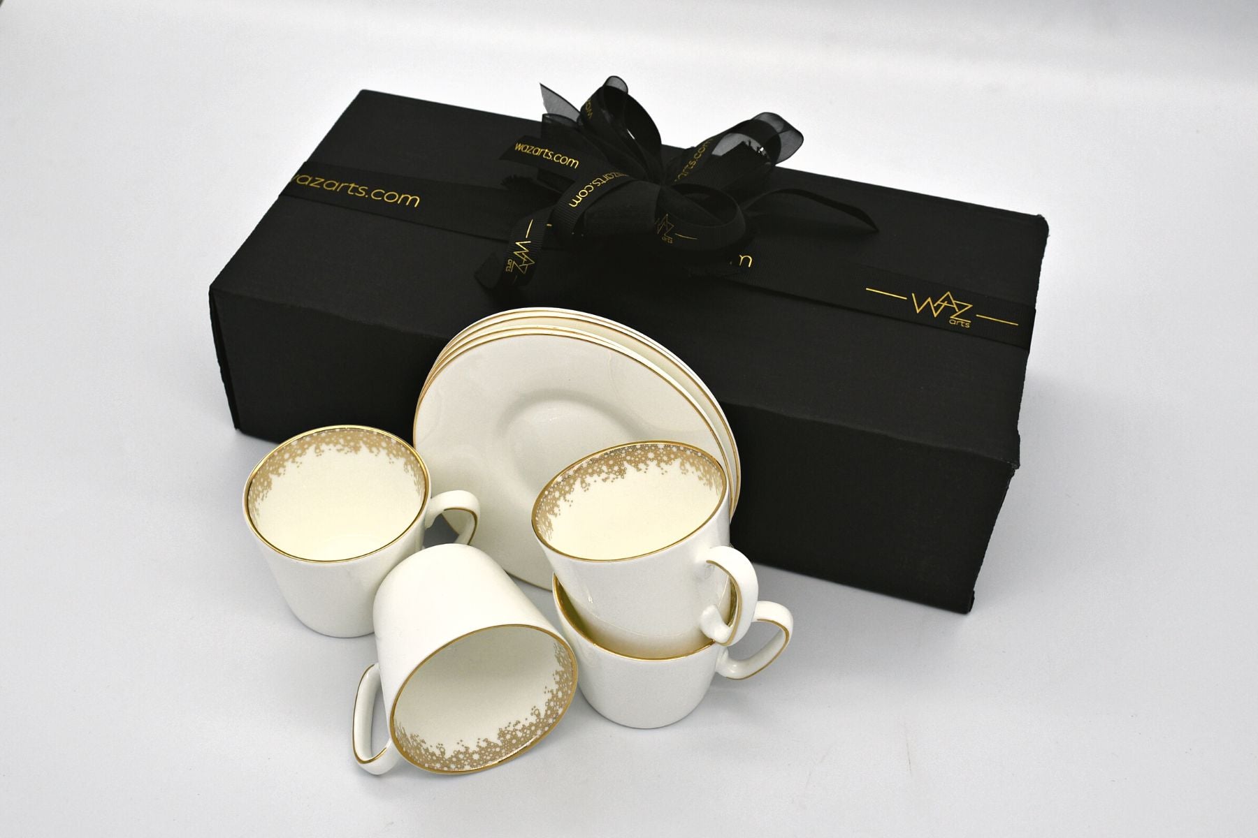 Side angle view of the complete geometric Arabic coffee cup set