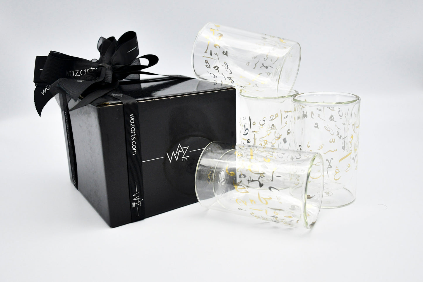 Elegant silver tea cup with Arabic script design