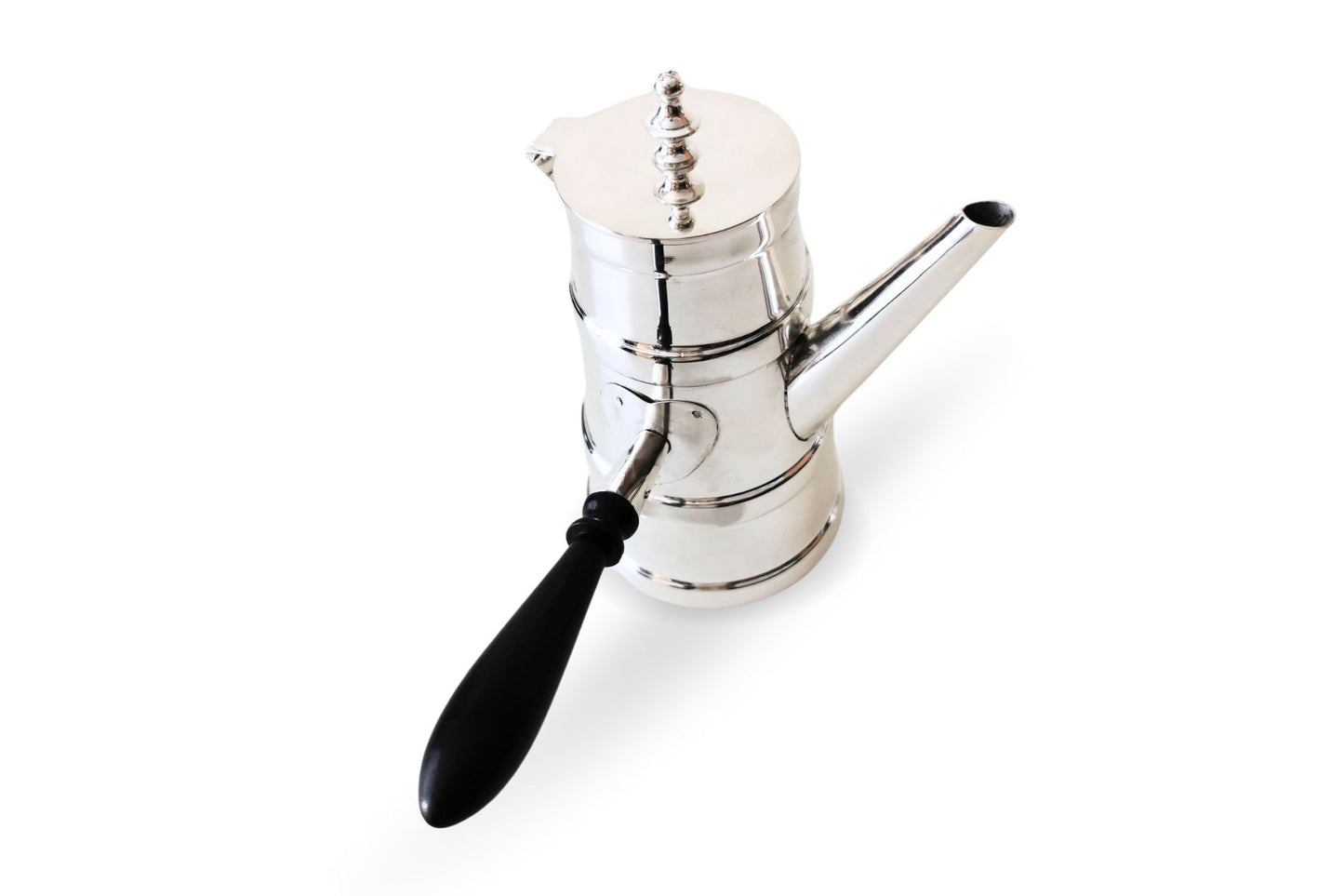 Close-up of Dallah spout – silver Arabic coffee pot