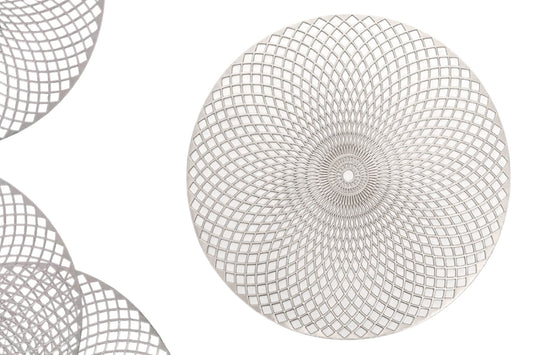 Overview of gold leaf-shaped placemat on a dining table